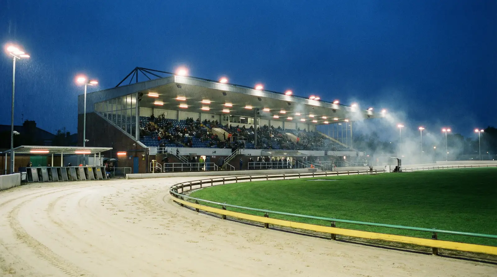 Doncaster greyhound stadium track view on a race day evening