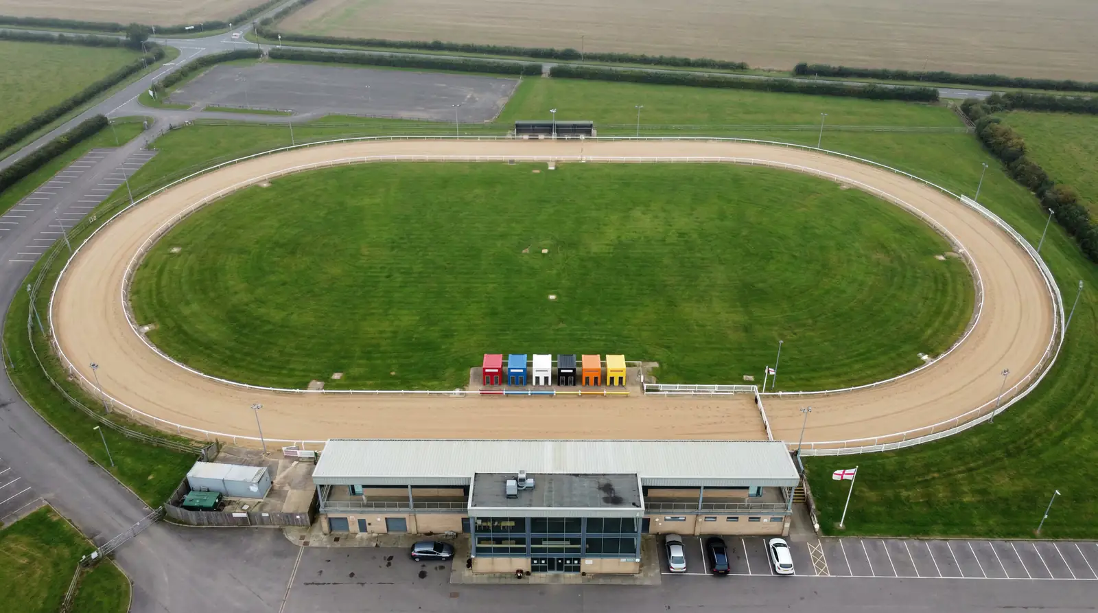 Aerial view of Doncaster greyhound stadium sand track showing bends and home straight